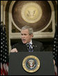 President George W. Bush gestures as he addresses reporters during his news conference Wednesday, Dec. 20, 2006, in the Indian Treaty Room at the Eisenhower Executive Office Building in Washington, D.C., speaking on the challenges in Iraq and working with the new Congress in 2007.  White House photo by Kimberlee Hewitt