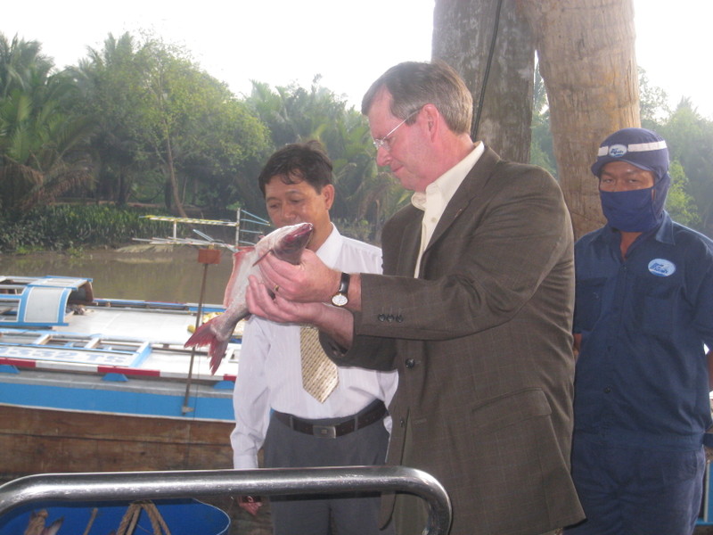 Mike Leavitt at fish farm in Viet Nam