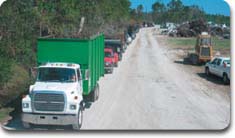 U.S. Army Corps of Engineers hauling away debris