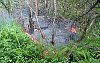 Pahoehoe flow moves along base of Pulama Pali, Kilauea Volcano, Hawai`i 