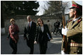 Laura Bush arrives at the Presidential Palace accompanied by U.S. Ambassador to Afghanistan Zalmay Khalilzad and Under Secretary of State for Global Affairs Paula Dobriansky in Kabul, Afghanistan Wednesday, March 30, 2005. 