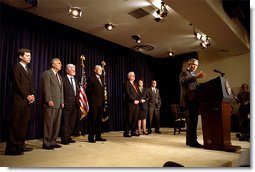 President George W. Bush speaks before signing the Enhanced Border Security and Visa Entry Reform Act in the Presidential Hall in the Dwight D. Eisenhower Executive Office Building May, 14. Pictured with the President, from left to right, are: Sen. Sam Brownback of Kan., Rep. George Gekas of Penn., Sen. Edward Kennedy of Mass., Sen. Orrin Hatch of Utah, Rep. James Sensenbrenner of Wis., Sen. Dianne Feinstein of Calif., and Sen. John Kyl of Ariz. "The purpose of this bill is to help our country do a better job of border security. It authorizes 400 additional inspectors, investigators, and other staff on the INS over the next five years," explained the President. White House photo by Paul Morse.