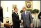 President George W. Bush shakes hands with Prime Minister Peter Medgyessy of Hungary at the end of their meeting in the Oval Office, Tuesday, June 22, 2004. White House photo by Eric Draper