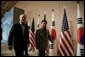 President George W. Bush and Moo Hyun Roh, President of the Republic of Korea, leave the stage at the Hotel Hyundai in Gyeongju, Korea Thursday, Nov. 17, 2005, after a joint press availability. White House photo by Eric Draper