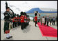 President George W. Bush walks with Governor General Michaelle Jean upon his arrival to Ottawa, Canada, Monday, Aug. 20, 2007, for the North American Leaders' Summit. White House photo by Eric Draper