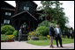 President George W. Bush stands with Canada's Prime Minister Stephen Harper after arriving Monday, Aug. 20, 2007, for their bilateral meeting at the Fairmont Le Chateau Montebello in Montebello, Canada. White House photo by Eric Draper