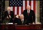 Vice President Dick Cheney and Speaker of the House Dennis Hastert (R-IL), right, welcome, Iraqi interim Prime Minister Ayad Allawi, center, before he addresses the joint meeting of Congress on Capitol Hill Thurs., Sept. 23, 2004. White House photo by David Bohrer