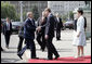 Prime Minister Ferenc Gyurcsany and his wife Dr. Klara Dobrev welcome President George W. Bush and Mrs. Laura Bush to the Hungarian Parliament building in Budapest, Hungary, Thursday, June 22, 2006. White House photo by Eric Draper