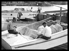 fisherman in a small boat