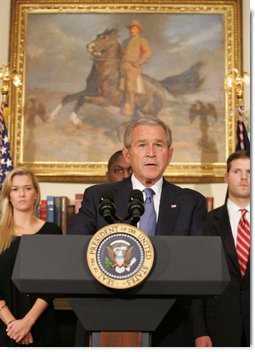 President George W. Bush delivers a statement on the War Supplemental Monday, Oct. 22, 2007, in the Roosevelt Room of the White House. Joined by veterans, members of military support organizations and families of the fallen, the President said, "These patriots have come to the Oval Office to make sure -- and to make clear -- that our troops have the full commitment of our government." White House photo by Chris Greenberg