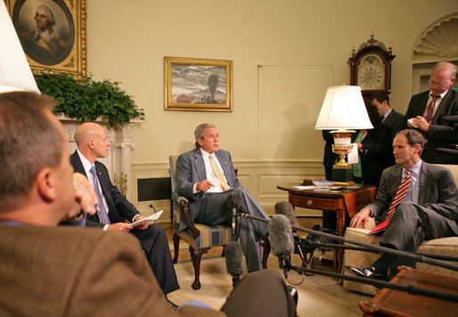 President George W. Bush discussed the economy with the press Friday, Oct. 5, 2007, in the Oval Office. Pictured with the President are, from left: OMB Director Jim Nussle, CEA Chairman Ed Lazear and NEC Director Al Hubbard. "I want to thank members of my economic team for coming in the Oval Office this morning to bring some good news here for America's families and America's working people. The -- last month our economy added 110,000 new jobs," said President Bush. "And that's good news for people here in our country. It's an indicator that this economy is a vibrant and strong economy." White House photo by Eric Draper