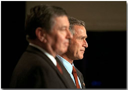 Introduced by Attorney General John Ashcroft, President George W. Bush addresses a group of new U. S. Attorneys at the Dwight D. Eisenhower Executive Office Building Nov. 29. White House photo by Paul Morse.