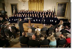 The St. Olaf Choir, led by Anton Armstrong, performs during the commemoration of the National Day of Prayer commemoration in the East Room Thursday, May 5, 2005. White House photo by Eric Draper