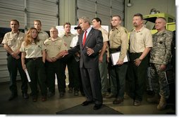 President George W. Bush delivers remarks after a briefing Tuesday, May 29, 2007 in Brunswick, Ga., on the Georgia and Florida wildfires. Said the President, "It's a very difficult period for the people, particularly in southeast Georgia and north Florida. A lot of lives are being affected. I've come down to let the people know that we are concerned about their livelihood and I'm fully aware of the nature of these fires, that we strongly support the efforts being done here to fight these fires, and we wish the people all the best."  White House photo by Eric Draper