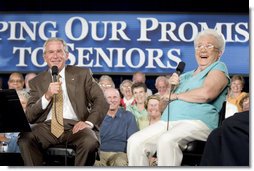 President George W. Bush shares a laugh with 82-year-old Margaret Cantrell of Scottsdale, during a Conversation on Medicare Monday, Aug. 29, 2005, at the Pueblo El Mirage RV Resort and Country Club in nearby El Mirage, Ariz. White House photo by Paul Morse