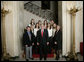 President George W. Bush stands with members of the Stanford University Women’s Cross Country Team Thursday, April 6, 2006, during a photo opportunity with the 2005 and 2006 NCAA Sports Champions at the White House. White House photo by Eric Draper