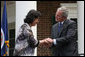 President George W. Bush shakes hands with new United States Citizens at Monticello's 46th Annual Independence Day Celebration and Naturalization Ceremony Friday, July 4. 2008, in Charlottesville, VA. White House photo by Joyce N. Boghosian