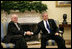 President George W. Bush and Prime Minister John Howard of Australia meet the press in the Oval Office Tuesday, May 16, 2006.