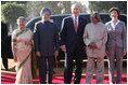 President George W. Bush and Laura Bush are greeted upon their arrival at Rashtrapati Bhavan, New Delhi, India, by India President A.P.J. Abdul Kalam; Prime Minister Manmohan Singh and his wife, Gursharan Kaur.