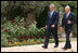 President George W. Bush and President Shimon Peres of Israel walk during their visit Wednesday, May 14, 2008, at the Jerusalem residence of President Peres.