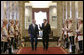 President George W. Bush and Bulgarian President Georgi Parvanov arrive for their meeting at the Coat of Arms Hall in Sofia, Bulgaria, Monday, June 11, 2007. White House photo by Eric Draper