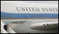 President George W. Bush and Laura Bush walk down the stairs from Air Force One on their arrival Friday, June 13, 2008, to Orly Airport in Paris. White House photo by Shealah Craighead