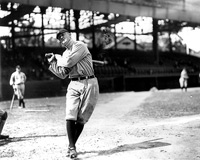 A baseball player swinging the bat.