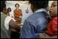 Laura Bush visits with women involved with the program, "Mothers to Mothers-to-Be," in Cape Town, South Africa, Tuesday, July 12. The program provides counseling, education and support to HIV/AIDS infected women during pregnancy. White House photo by Krisanne Johnson