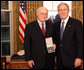 President George W. Bush stands with Andrew Marshall after presenting him with the 2008 Presidential Citizens Medal Wednesday, Dec. 10, 2008, in the Oval Office of the White House. White House photo by Chris Greenberg