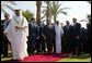 President George W. Bush walks with Red Sea Summit participants from left, King Hamad Bin Issa Al Khalifa of Bahrain, King Abdullah Bin Al Hussein of Jordan, President Hosni Mubarak of Egypt, Prince Abdullah Bin Abd Al Aziz of Saudi Arabia, and Prime Minister Mahmoud Abbas from the Palestinian Delegation prior to giving statements in Sharm El Sheikh, Egypt June 3, 2003. White House photo by Paul Morse.