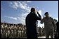 President George W. Bush salutes Major General Buford Blount, Commander of the 3rd Infantry Division (Mechanized) before addressing military personnel and their families at Ft. Stewart, Ga., Friday, Sept. 12, 2003.  White House photo by Paul Morse