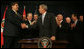 President George W. Bush shakes the hand of Peru's President Alan Garcia after signing H.R. 3688, the United States-Peru Trade Promotion Agreement Implementation Act, Friday, Dec. 14, 2007, in the Dwight D. Eisenhower Executive Office Building. In signing the agreement, the President said, "Peru and the United States are strong partners and today we're making that partnership even stronger."  White House photo by Joyce N. Boghosian