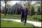 President George W. Bush and White House Chief of Staff Andrew Card wave to the press Thursday, April 13, 2006. Friday is Secretary Card's last day as Chief. Former Deputy White House Chief of Staff Josh Bolten will assume Secretary Card's responsibilities. White House photo by Eric Draper