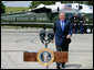 President George W. Bush walks to the podium before delivering a statement on the important milestone Iraqis reached today on their path to democracy, Saturday, April 22, 2006 in West Sacramento, California.  White House photo by Eric Draper