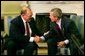 President George W. Bush meets with Swedish Prime Minister Goran Persson in the Oval Office Wednesday, April 28, 2004.  White House photo by Paul Morse