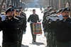 U.S. Army Staff Sgt. Brian L. Barnhart, a snare drummer assigned to the 3rd U.S. Infantry Regiment's Fife and Drum Corps, trails the ensemble down Sheridan Avenue Jan. 9, 2009, on Fort Myer, Va., during rehearsal for President-elect Barack Obama’s inaugural parade Jan. 20 in Washington, D.C. The Fife and Drum Corps will be marching 58 members during the parade, the largest number of performers in the corps' history.