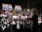 President George W. Bush speaks to a crowd of nearly 2000 people during an airport welcome at the Utah Air National Guard in Salt Lake City, Utah, Aug. 30, 2006.  White House photo by Eric Draper