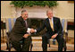 President George W. Bush and President Jalal Talabani of Iraq, shake hands Tuesday, Oct. 2, 2007, as they meet in the Oval Office. White House photo by Eric Draper