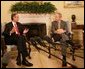 President George W. Bush listens to remarks by President Alvaro Colom Monday, April 28, 2008, in the Oval Office during a visit the Guatemalan leader and his wife to the White House. White House photo by Chris Greenberg