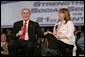 President George W. Bush and librarian Amy Borger talk about the strengthening of Social Security during a Town Hall meeting at the Montana ExpoPark in Great Falls, Mont., Thursday, Feb. 3, 2005. White House photo by Eric Draper