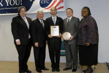 Deputy Secretary Troy accepts the Combined Federal Campaign’s Summit Award and Million Dollar Circle Award on behalf of Secretary Leavitt and HHS.