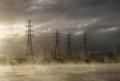 Mist is seen coming from the cooling pond at the brown coal Hazelwood Power Station in Latrobe Valley near Melbourne December 15, 2008.  REUTERS/Mick Tsikas  