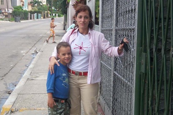 Tatiana Asis, shown with 6-year-old son Daniel, underwent a lengthy training process before becoming a full member of her synagogue.