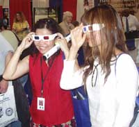 visitors use 3-D glasses to view three-dimensional anaglyphs that provided visitors a hands-on learning experience on how the agency uses technology to view digital landscapes