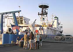 Photo of research team on dock nex to Bold ship