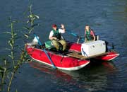 Man and woman in pontoon boat