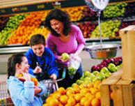 Mom with children at the grocery store