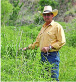 (photo: man in field)