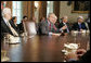 President George W. Bush meets bipartisan members of Congress Tuesday, July 18. 2006, in the Cabinet Room at the White House speaking about his recent trip to the G8 Summit in Russia. White House photo by Kimberlee Hewitt