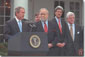 President Bush speaks at bill signing ceremony.